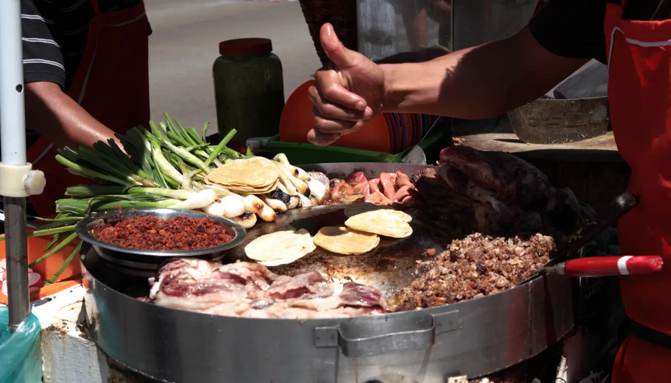 Traditional Guanajuato food including enchiladas mineras and street elote corn